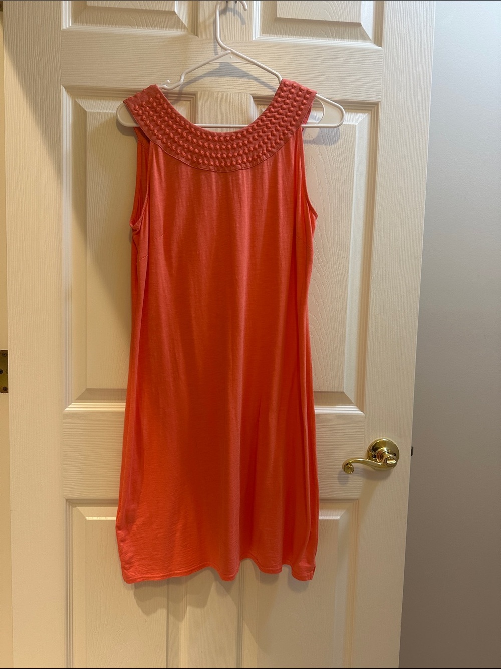 Sleeveless Coral Mini Dress with Textured Yoke